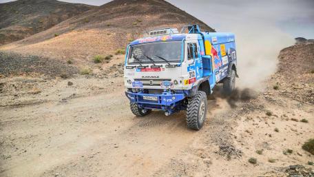 Extreme Off-Road Rally Truck in Action wallpaper