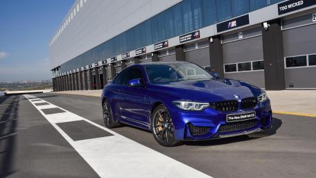 Sleek BMW Coupe in Racing Environment wallpaper