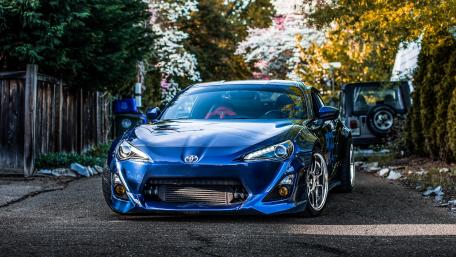 Sleek Blue Toyota Sports Car Wallpaper wallpaper
