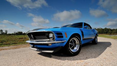 Classic Blue Muscle Car on Open Road wallpaper