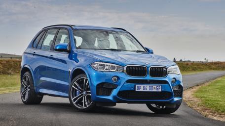 Sleek Blue BMW X5 SUV Wallpaper wallpaper
