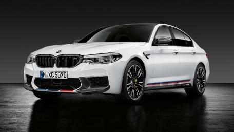 Sleek BMW M5 in Striking White Finish wallpaper