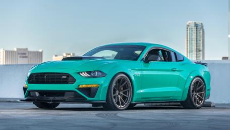 Vibrant Turquoise Sports Car Wallpaper wallpaper