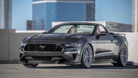 Sleek Mustang Convertible in Urban Setting wallpaper