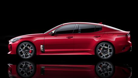 Sleek Red Sports Car Wallpaper in Stunning 4K Resolution wallpaper