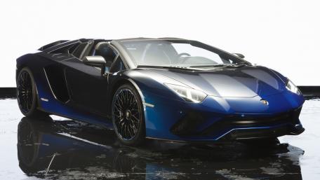 Sleek Blue Lamborghini Aventador Roadster Wallpaper wallpaper