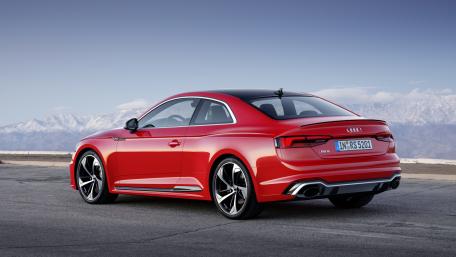 Stylish Red Audi RS5 on a Mountain Road wallpaper