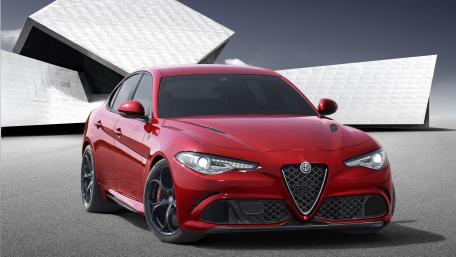Sleek Red Sports Car Wallpaper wallpaper