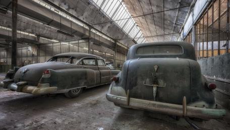 Vintage Cars in an Abandoned Setting wallpaper