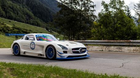 Sleek Mercedes in Scenic Mountain Landscape wallpaper