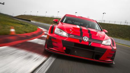 Dynamic Red Race Car in Action wallpaper