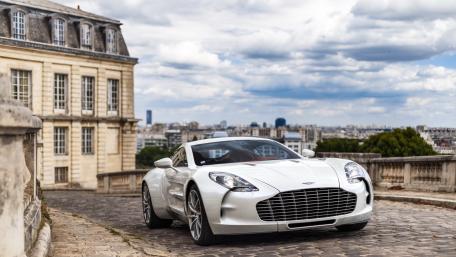 Sleek Luxury Car on Parisian Streets wallpaper