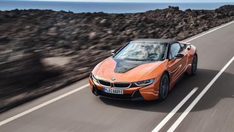 Sleek Orange BMW i8 on Open Road wallpaper