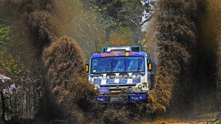 Powerful Rally Truck in Action wallpaper