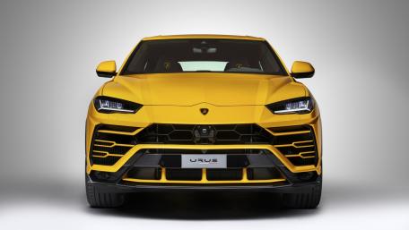 Bold and Luxurious Yellow Lamborghini Urus Wallpaper wallpaper