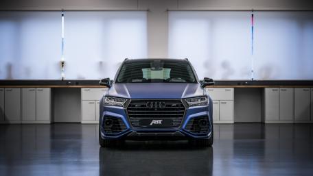 Sleek ABT Audi SQ5 in a Modern Studio Interior wallpaper
