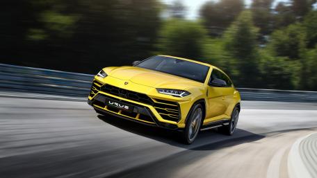 Stunning Yellow Lamborghini Urus in Motion wallpaper