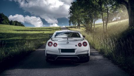 Sleek Nissan GT-R on a Serene Country Road wallpaper