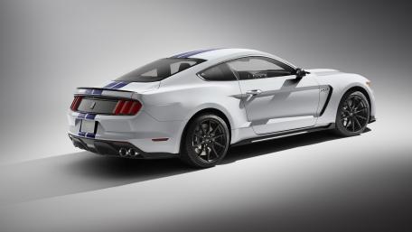 Sleek White Mustang with Striking Blue Accents wallpaper