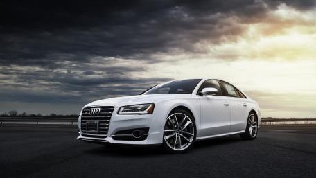 Sleek Audi A8 Under Dramatic Skies wallpaper