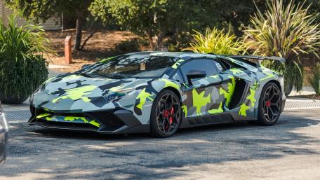 Sleek Camouflage Supercar Speed wallpaper