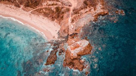Aerial View of Serene Coastal Landscape wallpaper