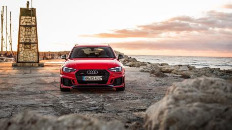 Sleek Audi RS on the Shoreline at Sunset wallpaper