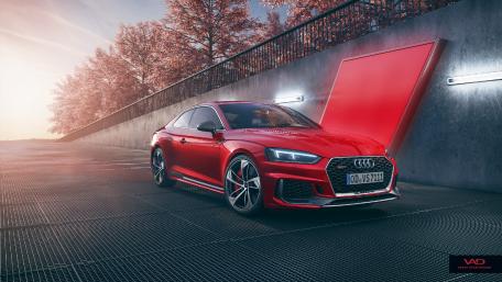 Sleek Red Audi Performance Automotive Wallpaper wallpaper