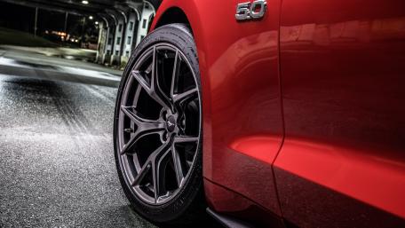 Stylish Red Car Close-Up Wallpaper wallpaper