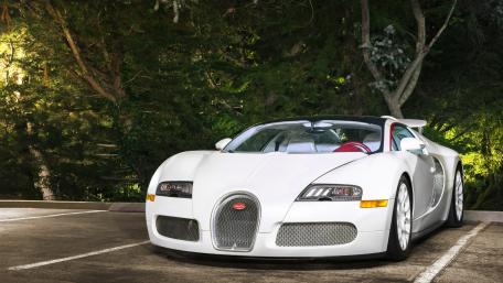 Sleek White Luxury Sports Car Wallpaper wallpaper