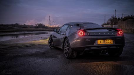 Sleek Lotus Car at Twilight Scene wallpaper