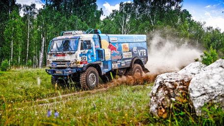 Off-Road Adventure of a Racing Truck Amidst Nature wallpaper