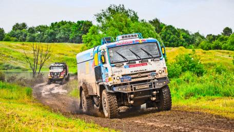 Off-Road Adventure with Powerful Trucks in Nature Landscape wallpaper