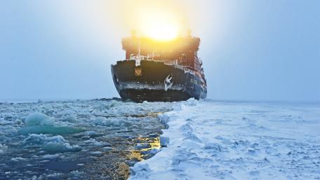 Majestic Icebreaker Conquering Arctic Seas wallpaper