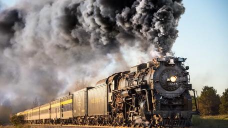 Majestic Steam Locomotive on the Rails wallpaper