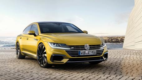 Sleek Volkswagen Car by the Shoreline wallpaper