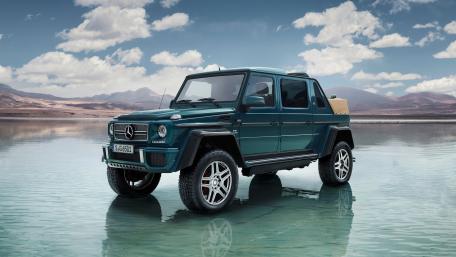 Sleek Luxury SUV in a Stunning Landscape wallpaper