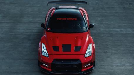 Sleek Red Sports Car Wallpaper for Enthusiasts wallpaper