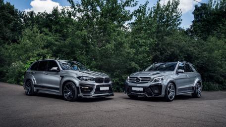 Sleek SUVs in Nature’s Embrace wallpaper