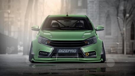 Sleek Green Car in an Urban Setting wallpaper