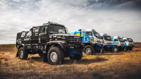 Powerful Rally Trucks Ready for Adventure wallpaper