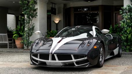 Sleek Pagani Hypercar in Urban Setting wallpaper