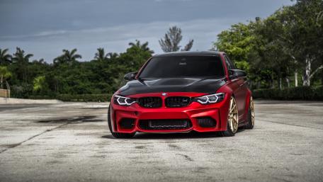 Sleek Red and Black Sports Car Wallpaper wallpaper