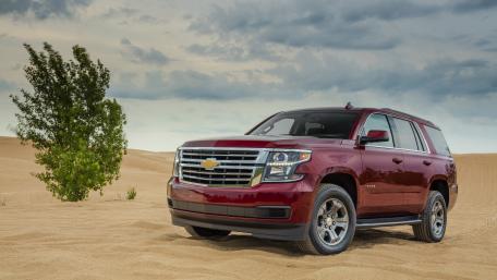 Elegant Chevrolet SUV in Desert Landscape wallpaper