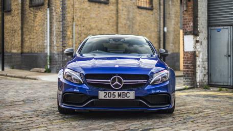 Sleek Blue Mercedes in Urban Setting wallpaper