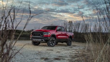 Bold Red Truck in Nature Scene wallpaper