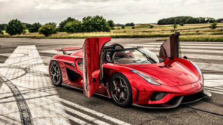 Stunning Red Supercar on an Airstrip wallpaper