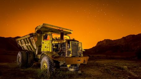 Rusty Dump Truck Under Starry Sky wallpaper