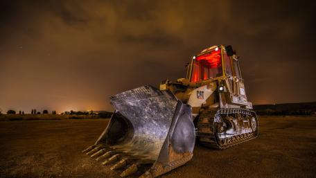 Heavy Machinery Under Twilight Skies wallpaper