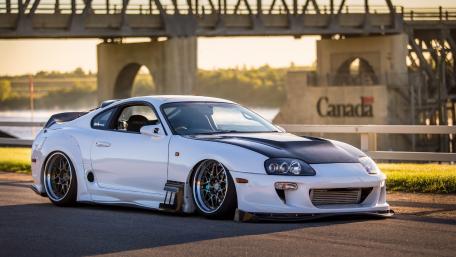 Sleek Toyota Supra Under a Bridge in Canada wallpaper